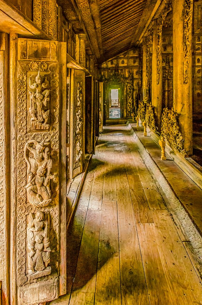 Shwemawdaw Golden Palace Monastery, Mandalay, Myanmar. Carved doorways in teakwood monastery.